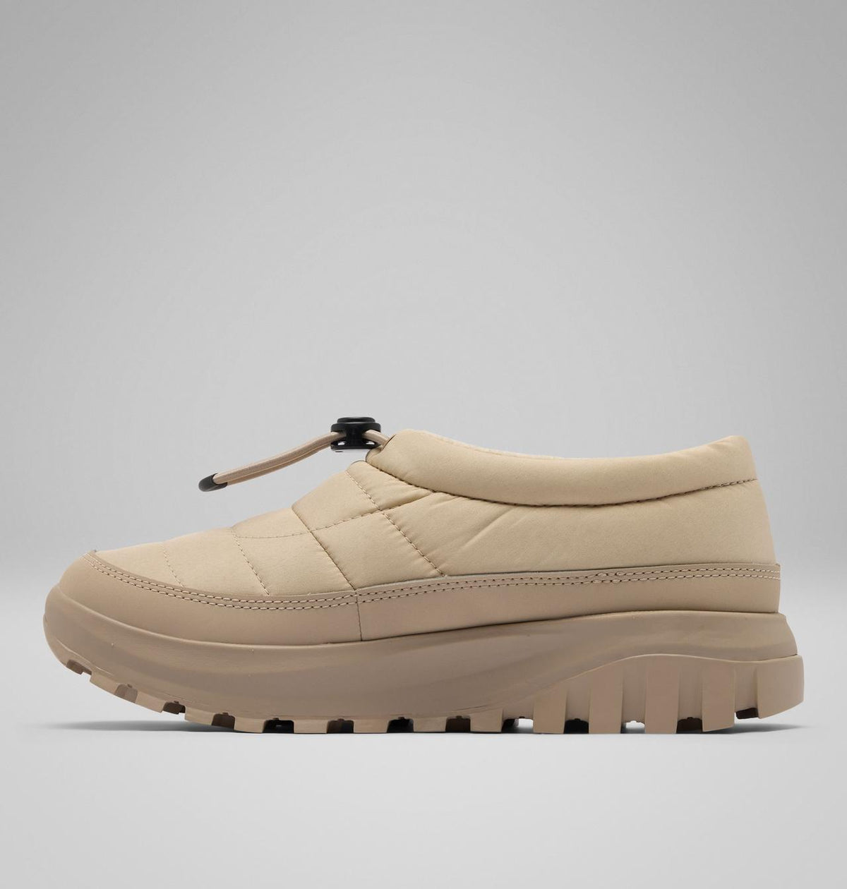 Columbia Snowtrot Unwind Puffy Mules Women product view 6 — Ancient Fossil, Oxford Tan