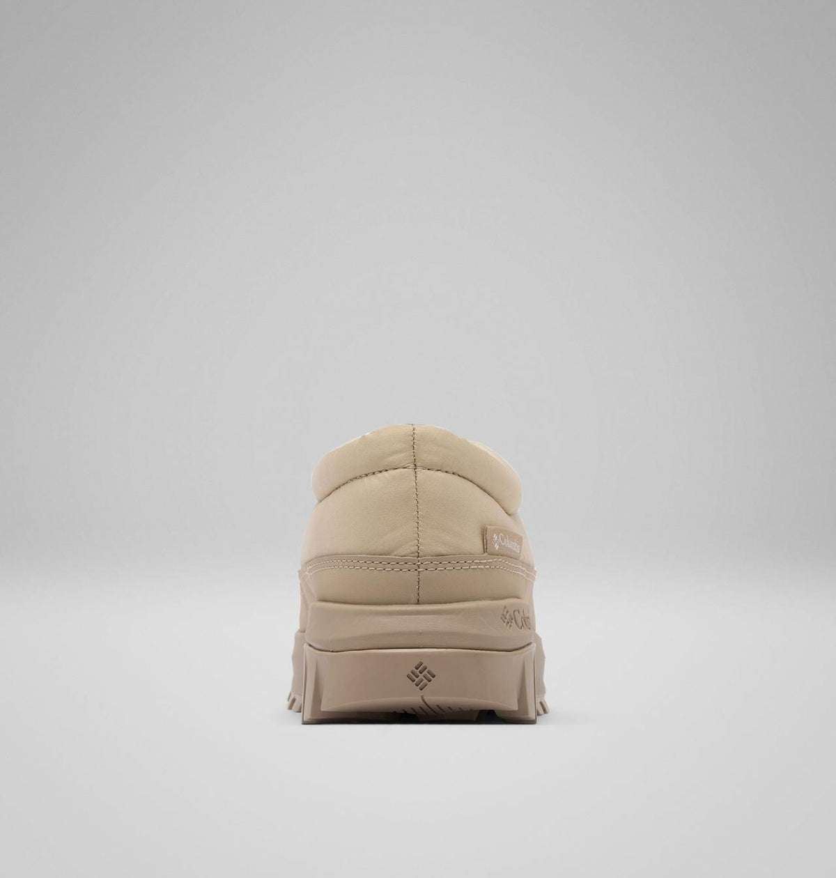 Columbia Snowtrot Unwind Puffy Mules Women product view 2 — Ancient Fossil, Oxford Tan