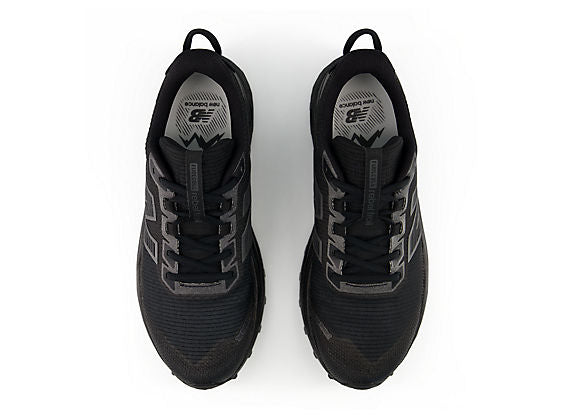 New Balance FuelCell Rebel Trail Men product view 4 — Black / Black Metallic